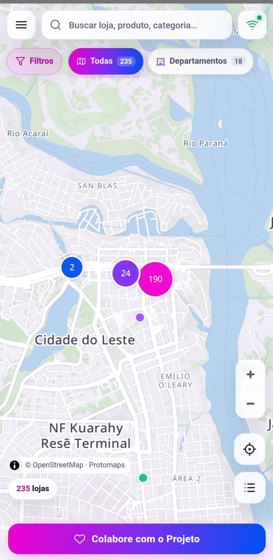Mapa do app com as lojas agrupadas em bolhas coloridas por categoria sobre o mapa de Ciudad del Este